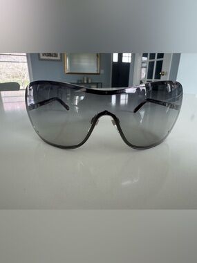 CHANEL Collection Perle Eyewear in Dark Brown with pearl details.